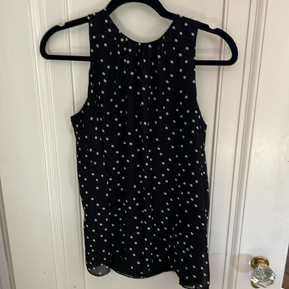 Tank or camisole style dressier top.